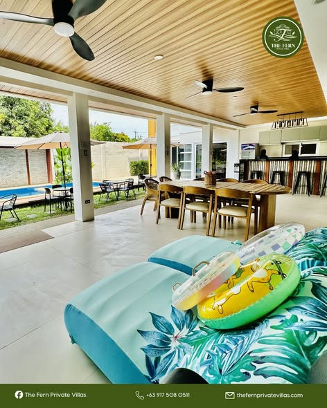 Open lounge, dining space, and pool view at The Fern Private Villas